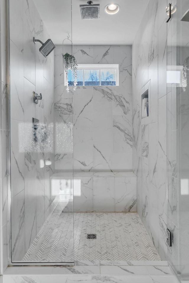 bathroom featuring walk in shower