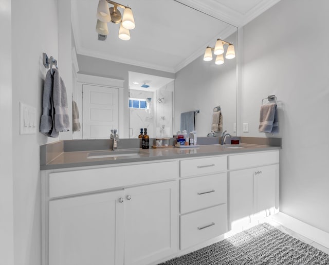 bathroom with ornamental molding, a shower with door, tile patterned flooring, and vanity