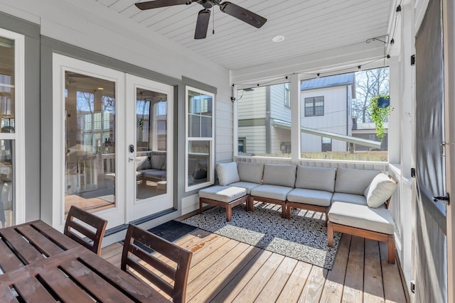 sunroom / solarium with ceiling fan and wood ceiling