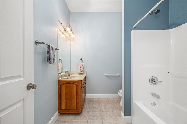 full bathroom featuring toilet, vanity, tile patterned floors, and washtub / shower combination