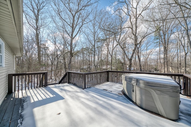 view of snow covered deck