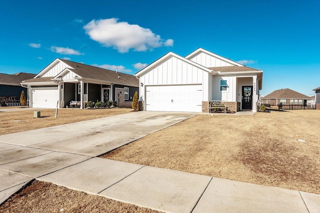 view of front of house with a front lawn and a garage