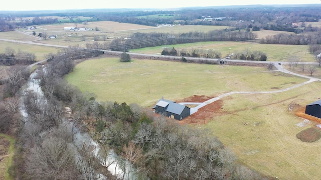 birds eye view of property featuring a rural view