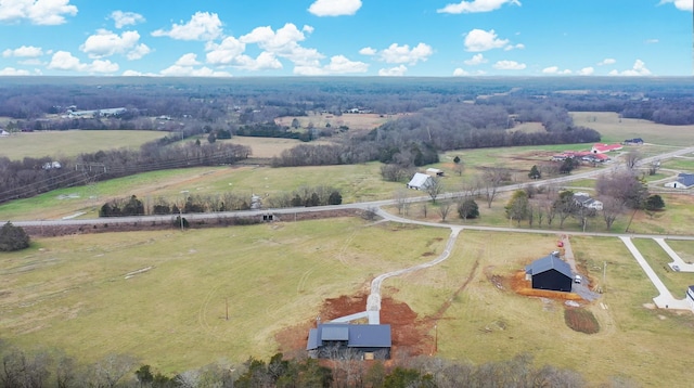 birds eye view of property featuring a rural view