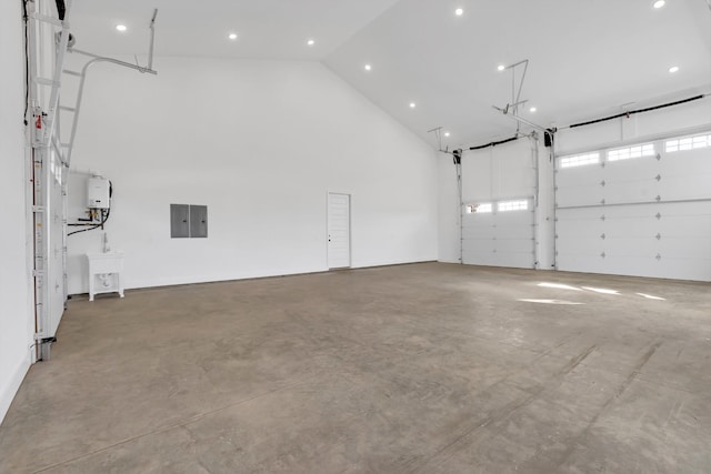 garage featuring water heater and sink