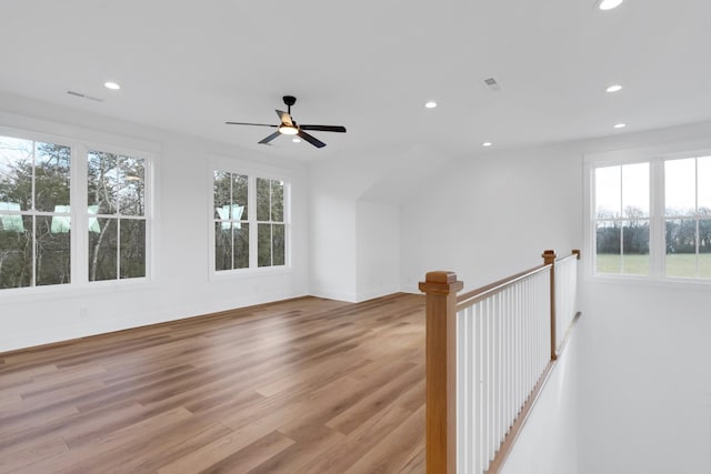 interior space featuring light wood-type flooring and ceiling fan