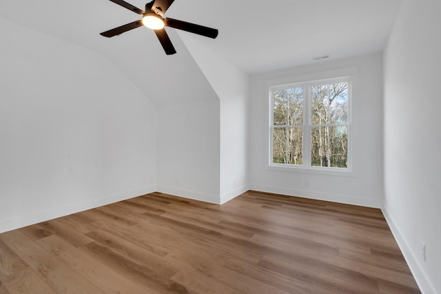 bonus room featuring lofted ceiling, ceiling fan, and light hardwood / wood-style flooring