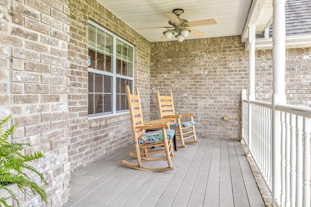 deck featuring a porch and ceiling fan