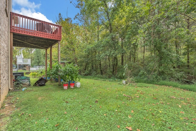 view of yard featuring a deck