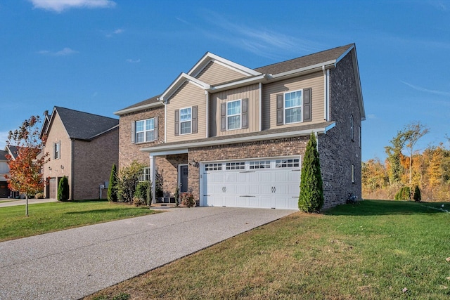 view of front of home with a front yard and a garage