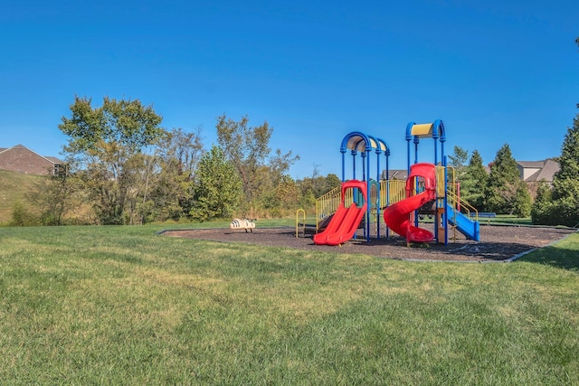 view of jungle gym with a lawn