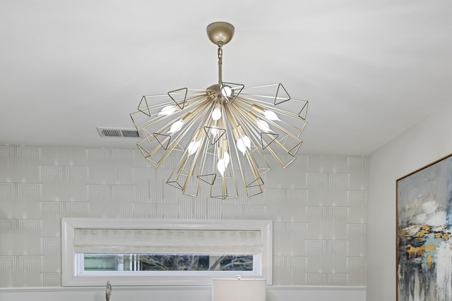 interior details with a chandelier