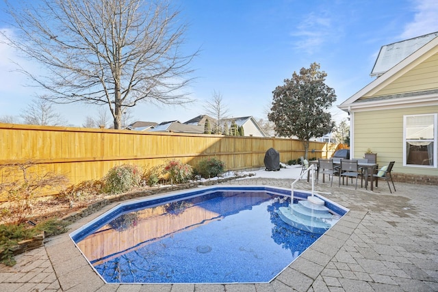 view of pool with a patio area