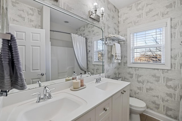 bathroom with toilet, tile patterned flooring, a shower with curtain, and vanity