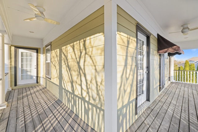 wooden terrace with ceiling fan