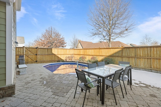 view of patio / terrace featuring a fenced in pool