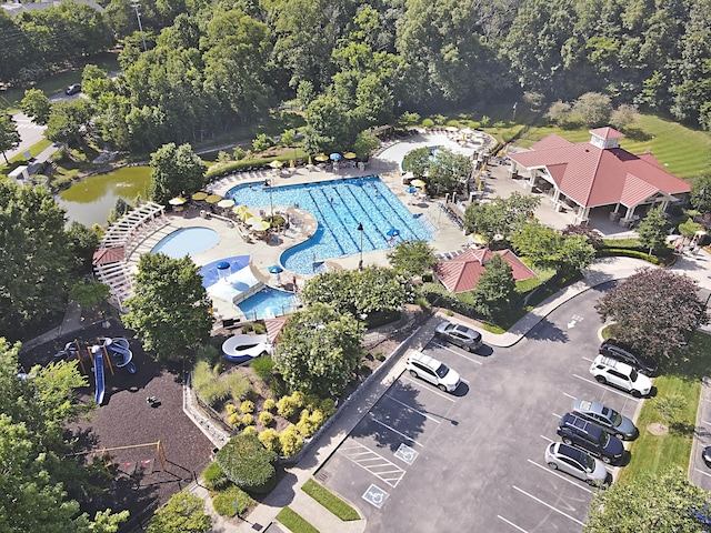 birds eye view of property with a water view