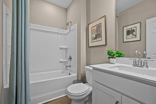 full bathroom featuring toilet, vanity, shower / bath combo, and hardwood / wood-style flooring