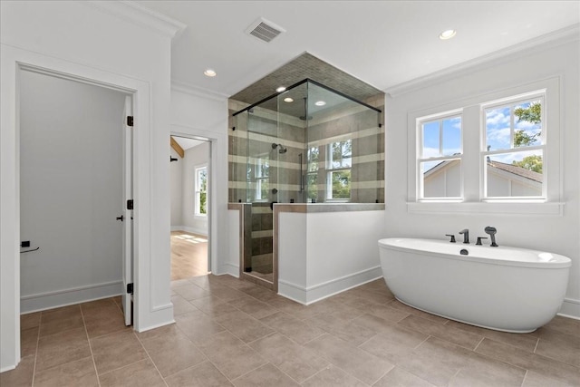 bathroom featuring independent shower and bath and crown molding