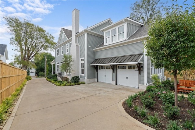 view of side of property featuring a garage