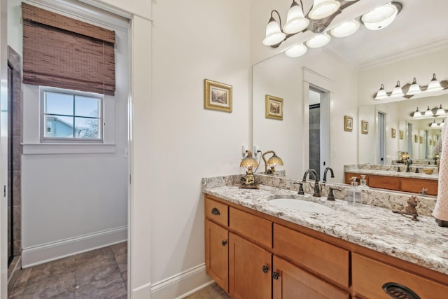 bathroom featuring a shower with door, ornamental molding, a chandelier, and vanity