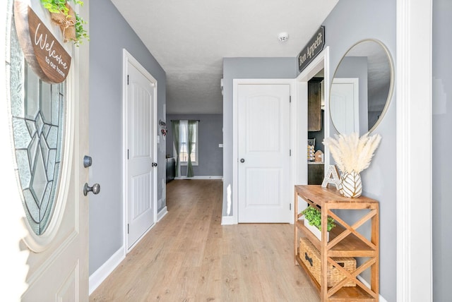 entryway with light wood-type flooring