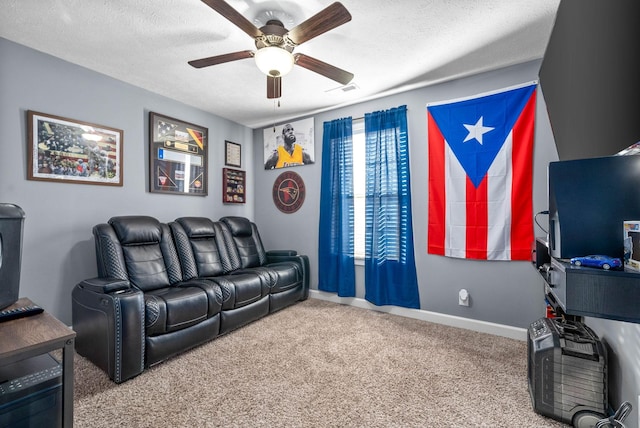 carpeted living room with ceiling fan and a textured ceiling