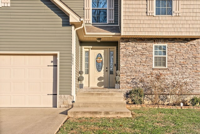 entrance to property featuring a garage