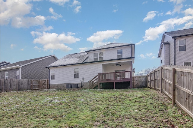 rear view of house featuring a deck, central AC unit, a lawn, and ceiling fan