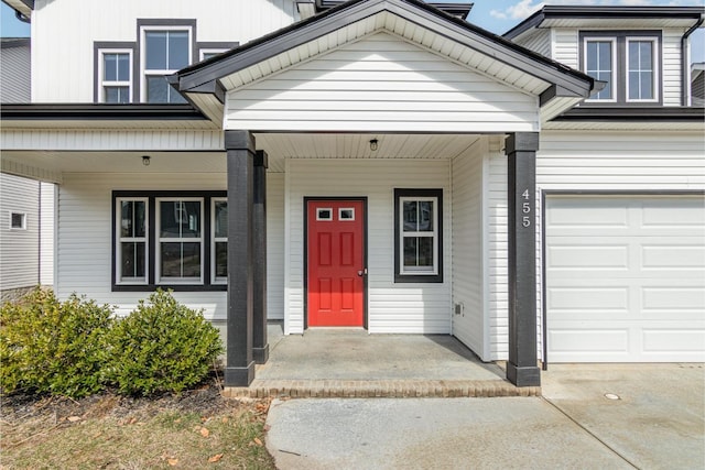 doorway to property with covered porch