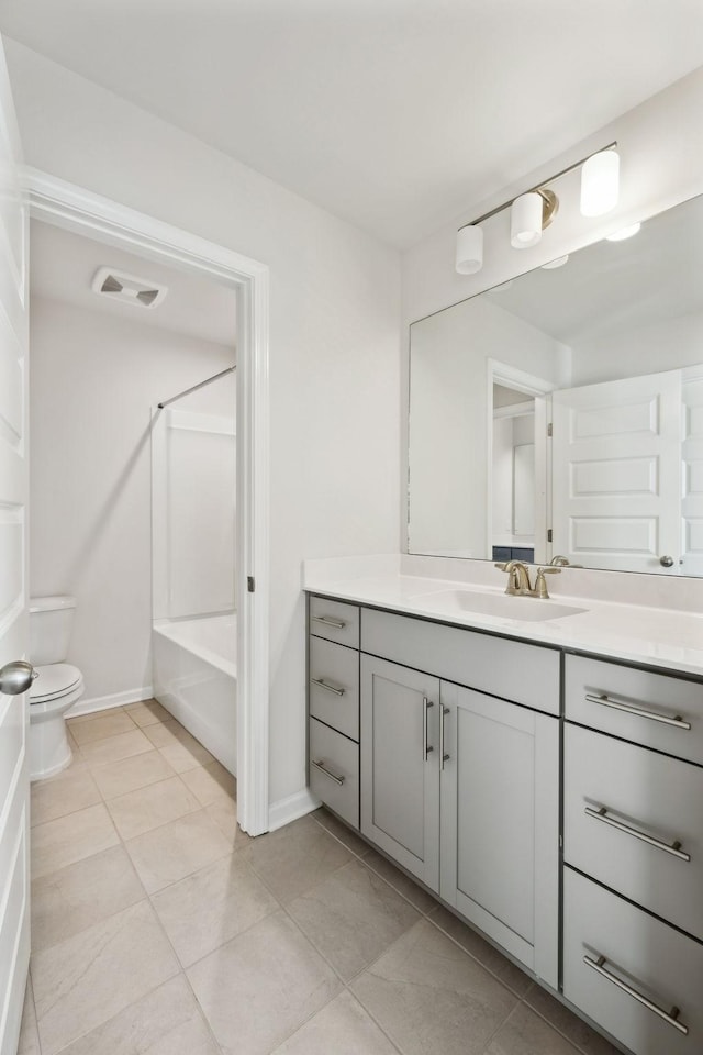 full bathroom featuring shower / bathtub combination, tile patterned floors, vanity, and toilet