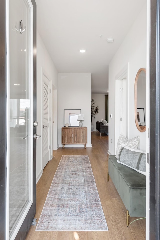 hall featuring light hardwood / wood-style floors