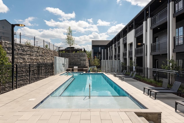 view of pool with a patio area