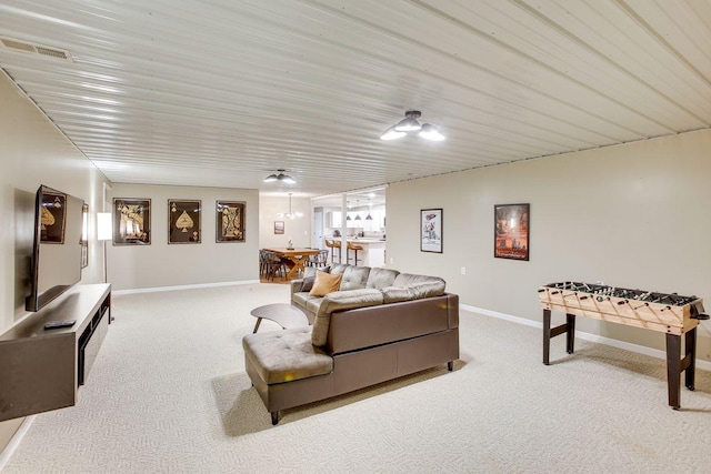 living room featuring light colored carpet