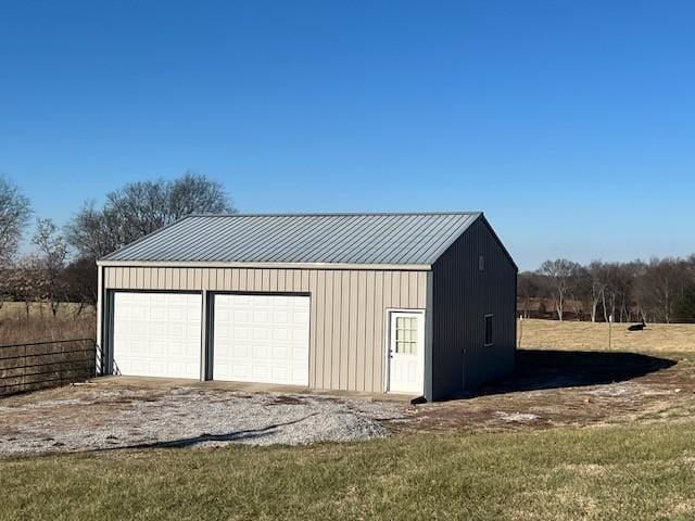 garage with a lawn