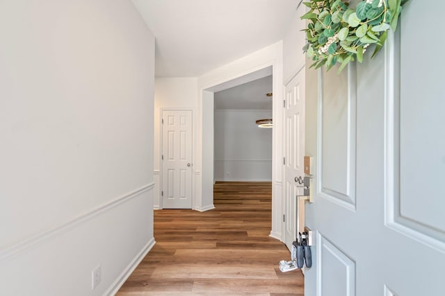 hallway featuring light hardwood / wood-style flooring