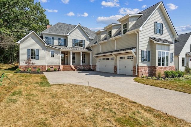 view of front facade featuring a front lawn and a garage