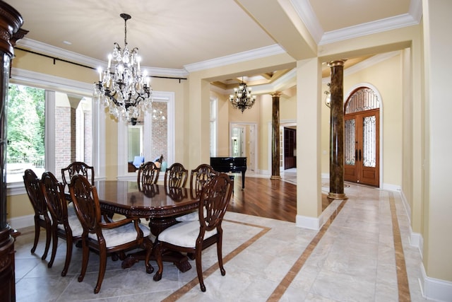 dining space with french doors, decorative columns, and ornamental molding