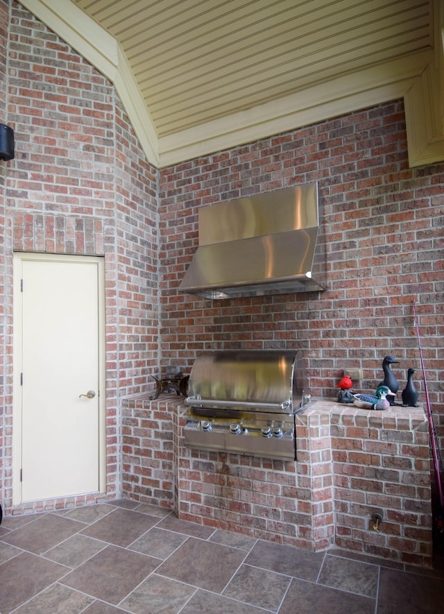 view of patio featuring an outdoor kitchen and area for grilling