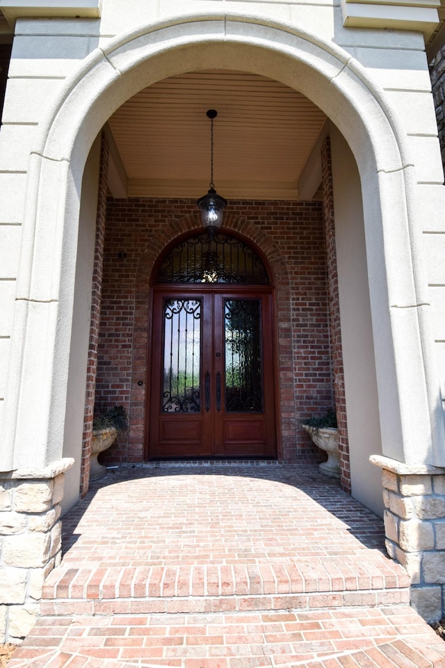 entrance to property featuring french doors