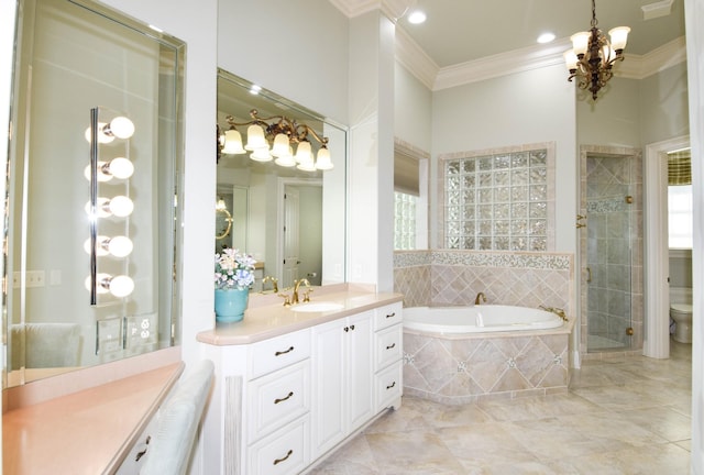 full bathroom featuring toilet, vanity, ornamental molding, independent shower and bath, and an inviting chandelier