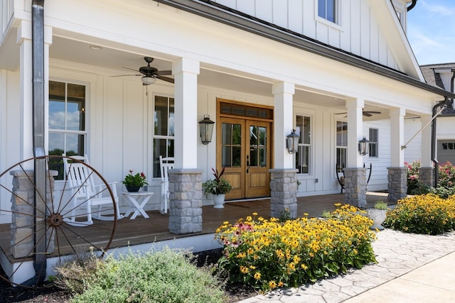 entrance to property with a porch, french doors, and ceiling fan