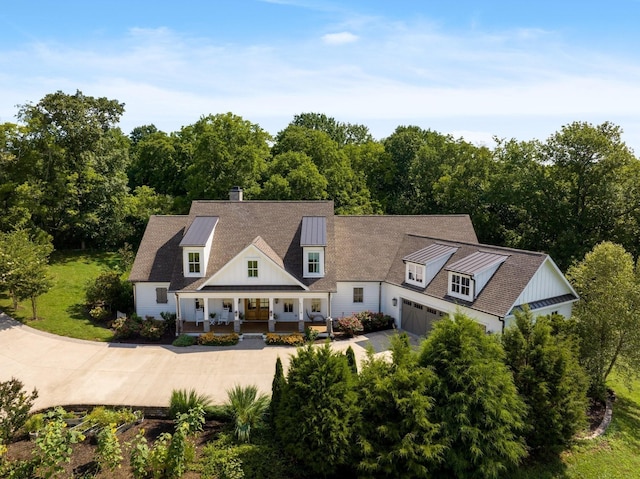 exterior space with a garage and a porch