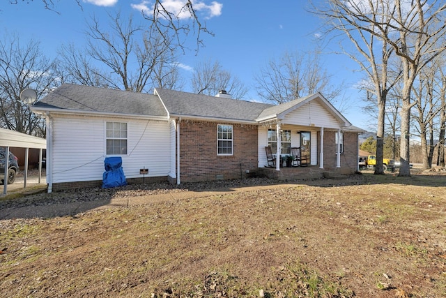 view of front of house featuring a front lawn and a porch