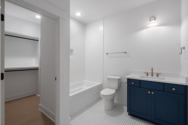 full bathroom featuring toilet, shower / bathing tub combination, and vanity