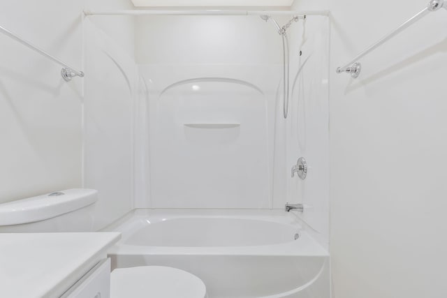 full bathroom featuring toilet, bathtub / shower combination, and vanity