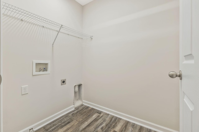 laundry room with electric dryer hookup, hookup for a washing machine, and dark hardwood / wood-style floors