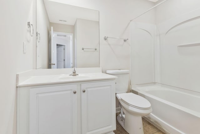 full bathroom featuring toilet, shower / washtub combination, vanity, and tile patterned floors