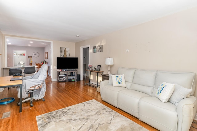 living room with hardwood / wood-style floors