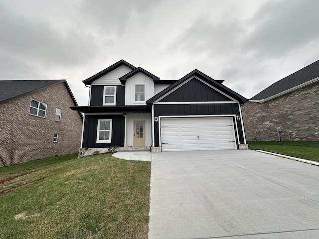 view of front of house with a front lawn and a garage